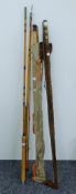 Four vintage fishing rods, the largest 365 cm long.