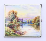 A silver and enamel cigarette case decorated with a country scene, possibly Bolton Abbey. 9 x 8 cm.
