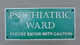 A cast iron 'Psychiatric Ward' sign. 27.5 cm wide.