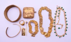 A quantity of yellow metal items of jewellery and a vesta case. The latter 4.75 cm wide.