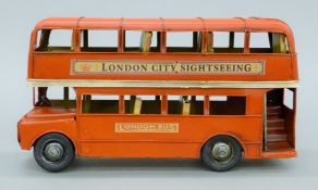 A tin plate London bus. 27 cm long.