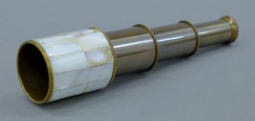 A mother-of-pearl mounted telescope. 18 cm long extended.
