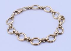 A 9 ct gold bracelet. 19 cm long. 19.5 grammes.