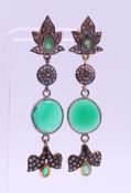 A pair of diamond and chrysoprase earrings. 6.5 cm high.