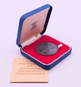 A boxed 1978 silver Westminster medal commemorating the 25th Anniversary of the Coronation of HM
