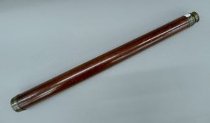 A Victorian mahogany-case single draw telescope. 78.5 cm long extended.
