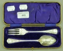 A boxed silver christening set hallmarked for Sheffield 1902. The case 19 cm wide. 75.2 grammes.