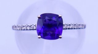 An 18 ct white gold dress ring. Ring size L/M. 2 grammes total weight.