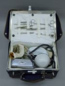 A mid-20th century midwife's travelling case. 32 cm wide.