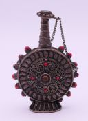 A Tibetan unmarked white metal snuff bottle. 8.5 cm high.