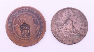 A 1770 Macuta Jose I Angola countermark coin and another coin.