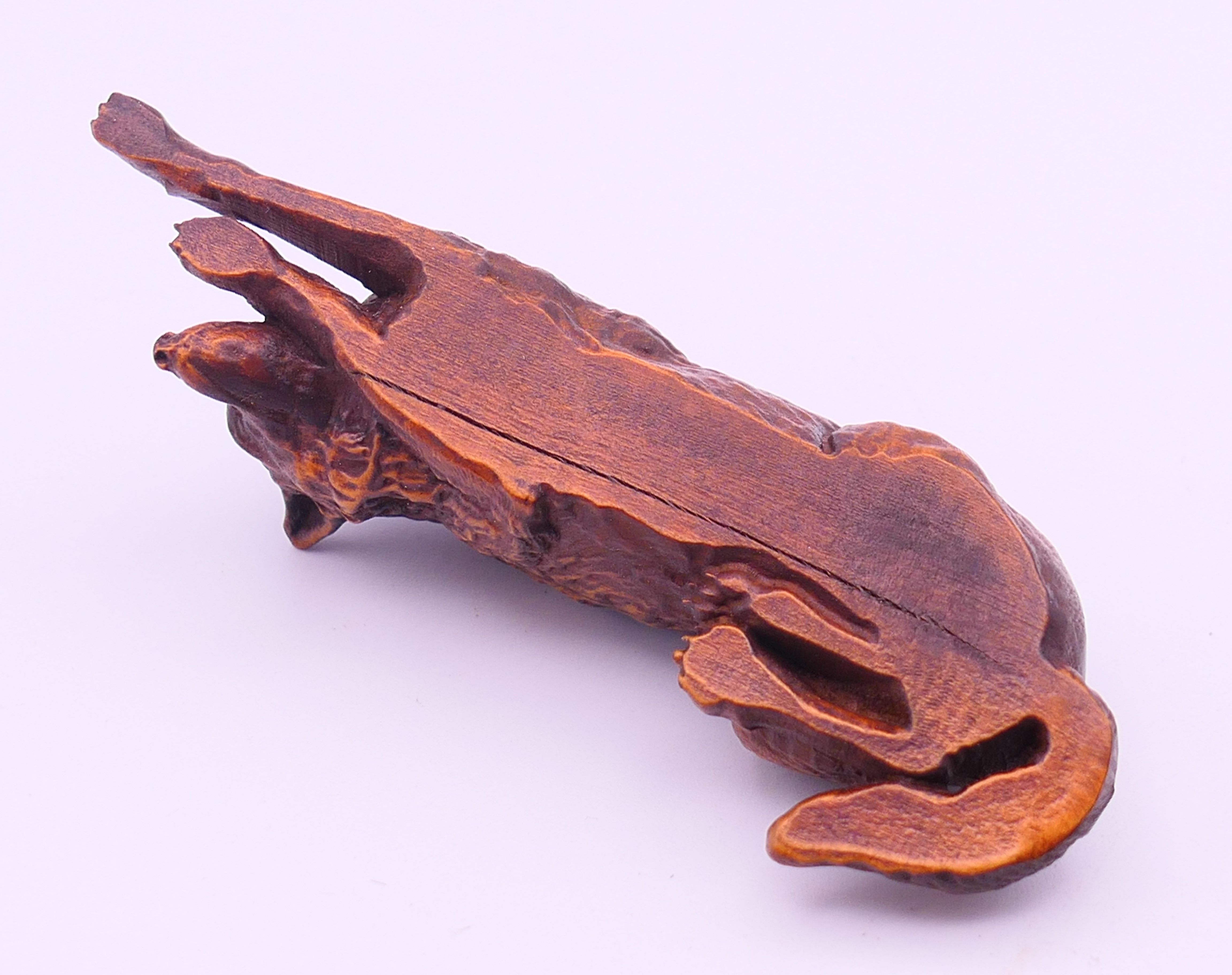 A wooden model of a wolf. 10.5 cm long. - Image 5 of 5