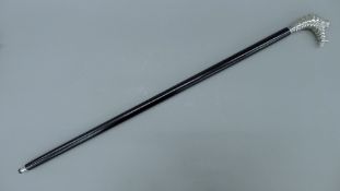 A 'Michelin man' walking stick. 96 cm long.