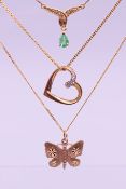 A 9 ct gold heart pendant on 9 ct gold chain,