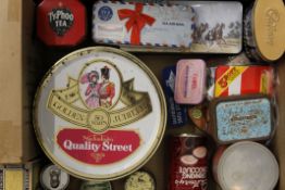 A quantity of various tins etc. The Quality Street tin 23 cm diameter.