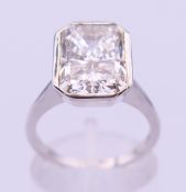 A 9 ct white gold and laboratory grown diamond solitaire ring.