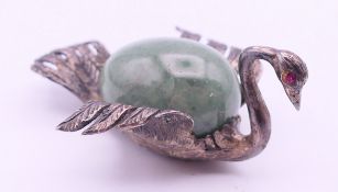 A silver and jade swan. 6 cm long.