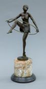 An Art Deco-style bronze of a girl with hoop. 48 cm high.