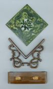 A Chinese carved jade plaque on stand. The stand 18 cm wide.