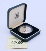 A boxed 1986 silver proof £2 coin.
