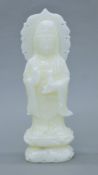 A carved hardstone figure of Guanyin. 30 cm high.