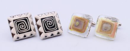 Two pairs of cufflinks, each in a Liberty box. Square black and white spiral pattern cufflinks 2.