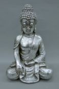 A silver-coloured seated Buddha. 52 cm high.
