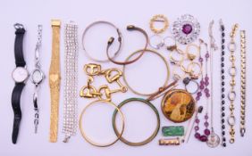 A collection of various jewellery watches and a compact. The latter 5 cm diameter.