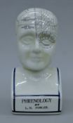A ceramic Phrenology head. 27 cm high.