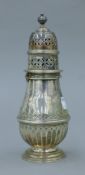 A silver sugar castor. 19 cm high. 261.3 grammes.