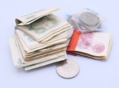 A quantity of vintage Bank of England bank notes (£1 and 10 Shillings),