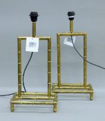 A pair of faux bamboo table lamps. Each 55 cm high.