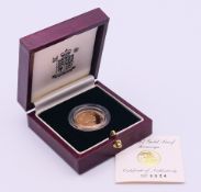A Royal Mint boxed 1997 gold proof sovereign together with a Royal Mint certificate of authenticity.