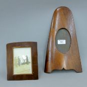 A photograph frame made from a propeller from a WWI aeroplane stamped Clerget 110 H P and a small
