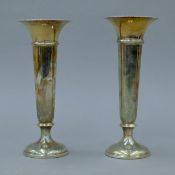 A pair of silver trumpet vases. 20.5 cm high. 465.3 grammes total weight.