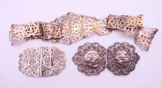 Two Victorian silver nurse's buckles and a silver-plated nurse's belt.
