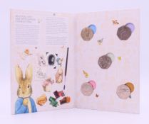 A Royal Mint Beatrix Potter and Her Best-Loved Characters 50 pence coin collector album.