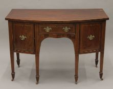 A 19th century mahogany bowfront sideboard. 114 cm wide.