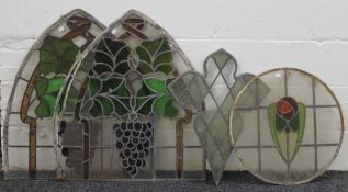 Four pieces of leaded stained glass. The largest 84 cm high.