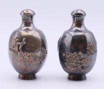 A pair of Japanese silver peppers. Each 8 cm high. 96.6 grammes.