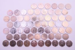 A collection of 50 pence pieces, including Beatrix Potter (Peter Rabbit, Benjamin Bunny,