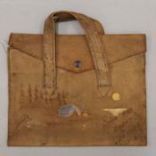 A Canadian tribal painted leather handbag. 20 cm wide.
