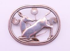 A Georg Jensen silver deer form brooch. 4.5 x 3.5 cm. 15.7 grammes.