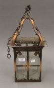 An Arts & Crafts copper hanging lantern. 44 cm high.