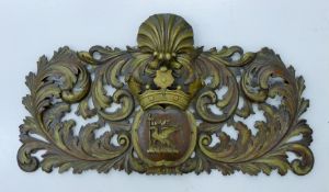 A gilt heightened 19th century carved oak crest. 74 cm wide.