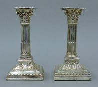 A pair of silver candlesticks. 17 cm high.