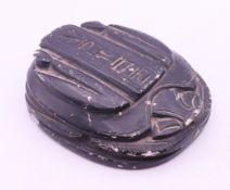 An Egyptian scarab beetle seal. 8 x 7 cm.