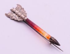 A Victorian unmarked silver and agate arrow brooch. 8.5 cm long.