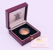 A Royal Mint boxed 1997 gold proof sovereign together with Royal Mint certificate of authenticity.