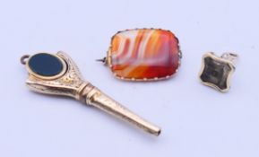 A Victorian unmarked 9 ct gold swivel pocket watch key,